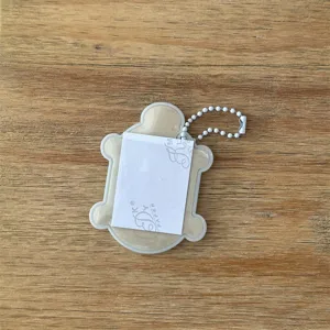 Détail de porte-clés porte-carte en forme de tortue mignonne, étui de photo portable.