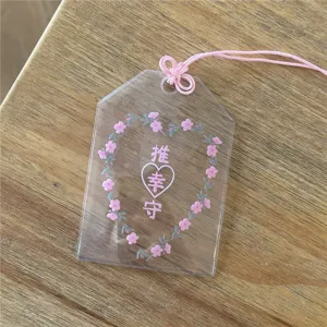 Clear PVC amulet photocard holder with pink strap, cute floral heart design for 3 inch cards.