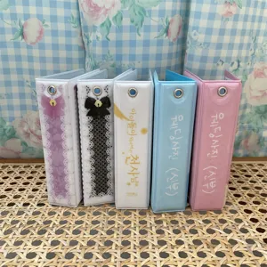 Close-up detail of Korean style 3-inch mini photocard binder, cute kpop idol album.
