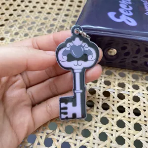 Cute anime style acrylic key shaped keychain pendant for bags, keys, and collections.