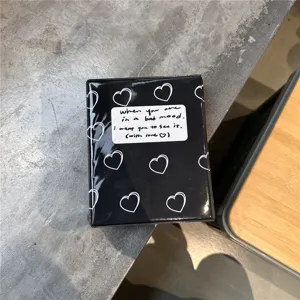 Black heart pattern 3-inch photocard binder detail view, stylish collectible photo card album.