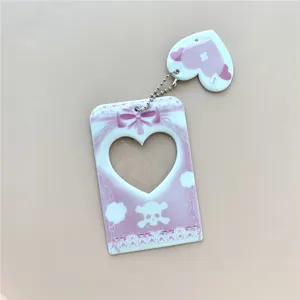 Pink cute dark style 3-inch photocard holder with heart cutout and skull charm for idol cards.