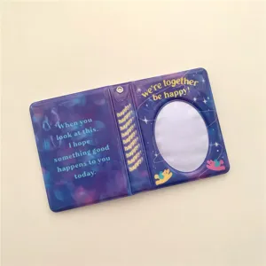 Detailed view of the cute purple mini photocard album with oval hollow design and sweet bear graphics.