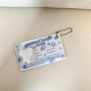 Blue heart cutout photocard holder with star print and metal ball chain id card case detail