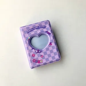 Mini 3 inch photocard binder detail view, purple checkered cover with heart window design.