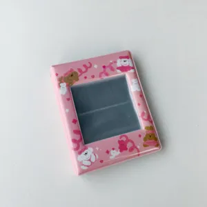 Mini álbum de fotos rosa de 3 pulgadas con diseño de perro de dibujos animados y tarjetero.