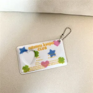 Acrylic photocard holder keychain with heart window and cute stars, perfect for ID photos.