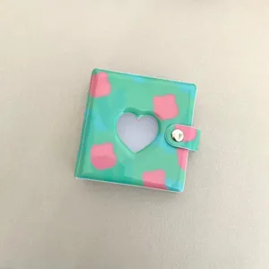 Mini album φωτογραφιων PVC 3 ιντσων με κοψιμο καρδιας και κουμπι για συλλογη καρτων.