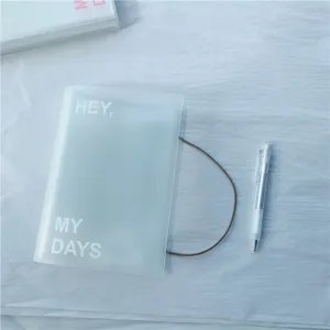 Frosted translucent binder with elastic band for stickers and cards detail presentation.