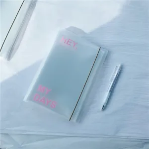 Translucent frosted binder with elastic band and pink letters, ideal for sticker and card storage.