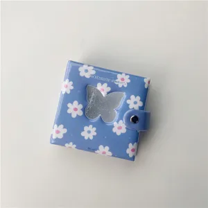 Mini classeur de photocard Polaroid 3 pouces avec motif marguerite et fenêtre papillon.