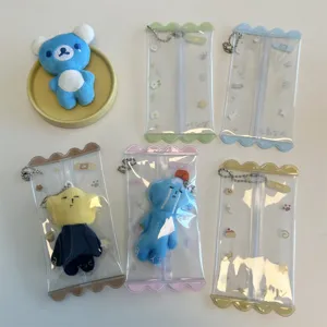 Muñeca peluche Yukio y bolsa almacenamiento transparente PVC para caramelos bonitos.