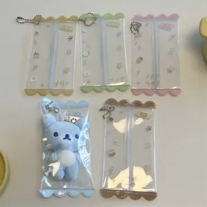 Bolsa de almacenamiento transparente de PVC para muñecas forma caramelo estuche antipolvo.