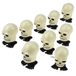 Jouets rigolos de crâne à remonter pour fêtes d'Halloween, squelette sautant en gros.