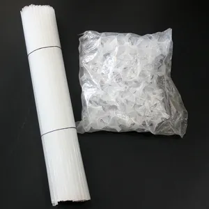 Detailed view of clear white plastic balloon sticks and cup holders, sturdy support rods.
