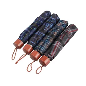 Three-fold inverted pole plaid umbrella mini portable sun umbrella for outdoor travel use.
