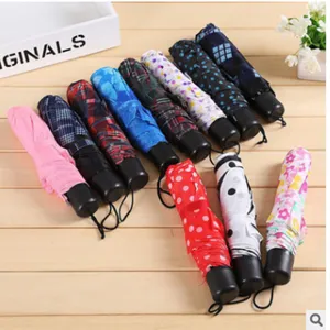 Portable folding umbrella with multi-color patterns, mini compact sun umbrella for travel.