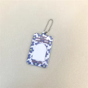 Purple floral photocard holder keychain detail, acrylic ID photo card sleeve pendant ID badge.
