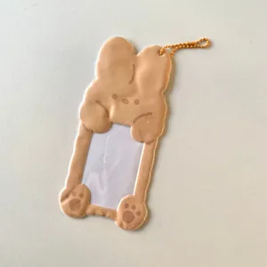 Detail view of the cute animal photocard holder with a ball chain, ideal for 3-inch cards.