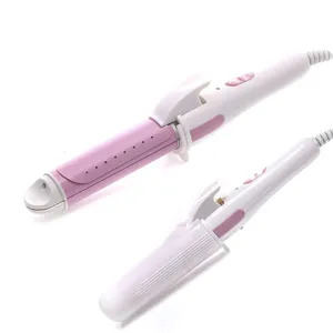 Detail view of dual use hair curling and straightening iron in white and pink colors.