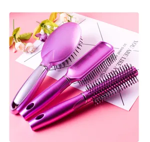 Pink hair brush set with cushion paddle and roller for smooth daily anti-static styling.