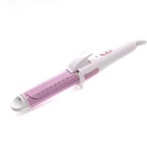 Detailed view of the pink and white hair curling iron showing the heating barrel and clamp design.