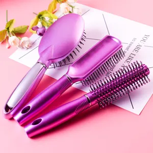 Hairdressing massage cushion brush and styling comb set in vibrant purple color for daily hair care.
