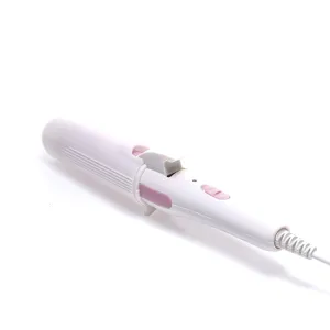 Detailed view of white pink curling iron hair styling tool compact electric hair curler styling