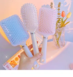 Lindo peine de masaje capilar con cojín de aire estilo coreano cepillo antiestático detalle