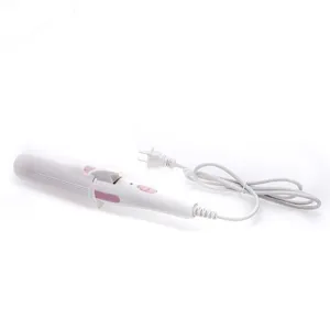 Detail view of the white and pink 2-in-1 hair curling and straightening styling iron.