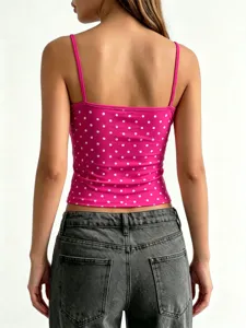 Canotta corta a pois rosa da donna, top smanicato slim estivo casual dettaglio.