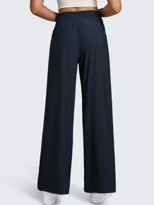 Detail view of women's high waist solid color loose wide leg casual pants back.
