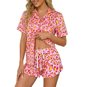 Women pink leopard print short sleeve pajama set sleepwear detail showing soft fabric and fit.