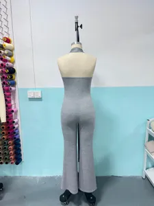 Gray halter backless tight jumpsuit detail view, showing soft ribbed stretch fabric.