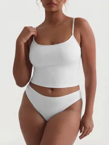 Detail shot of women's white camisole and briefs set, soft fabric, comfortable daily underwear.