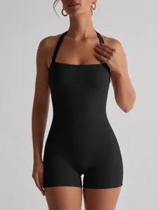 Detail view of women black ribbed halter neck romper, slim fit stretchy short jumpsuit.