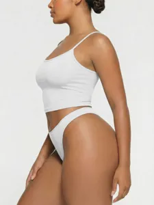 White sleeveless camisole and matching briefs set, comfortable summer casual apparel for women.