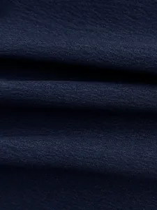 Dark blue fabric texture detail shot, soft double-layer material for wide leg pants.