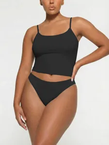 Detail view of women black camisole and brief matching set, soft fabric summer inner wear.