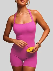 Pink ribbed halter neck romper detail view, comfortable casual summer fashion bodysuit.