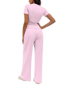Women pink casual pleated two-piece set, short sleeve top and long pants back view detail.
