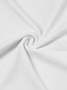 White ribbed knit fabric texture detail close-up showing soft elastic material quality close view