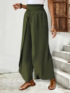 Olive green high waist split wide leg pants detail showing smocked elastic waistband style.
