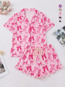 Set pigiama corto da donna rosa con stampa fiocco, abbigliamento notte comodo.