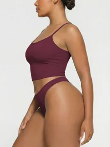 Detail view of the women's sleeveless camisole and underwear set in deep burgundy color.