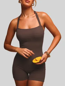 Close-up of ribbed halter romper in dark brown, featuring square neck and elastic slim fit.