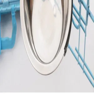 Détail de gamelle pour animal en acier inoxydable, fixation cage anti-renversement.