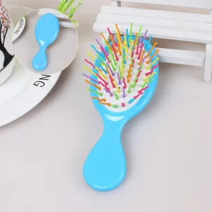 Brosse à cheveux coussin d'air couleur bonbon pour enfants, mini peigne antistatique.