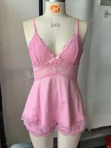 Comfortable pink lace camisole loungewear set with top and shorts for cozy everyday wear.