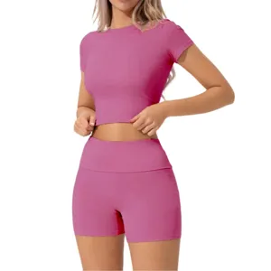 Rosa Kurzarm Crop Top und hochtaillierte Shorts Sportbekleidung Set Damen Sommer Freizeit.